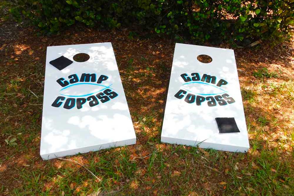 Camp Copass commercial cornhole set with full color custom branded logo | R&R Commercial Game Tables
