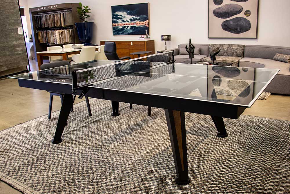 Glass top commercial ping pong table in design showroom | R&R Commercial